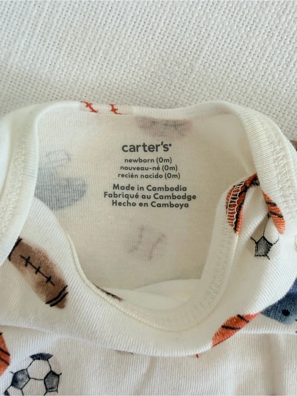 Carters Long-Sleeve Sports Print Onesie Bodysuit - Cream newborn